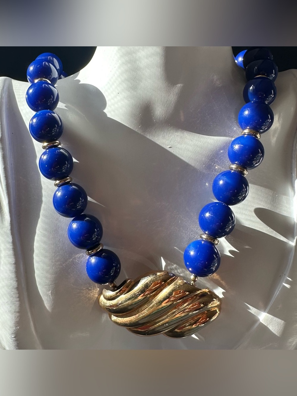 AVON Royal Blue Big Beaded Bib Necklace with Gold Tone Shell Pendant.